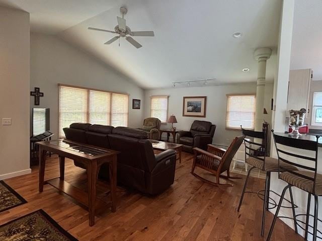 1020 Waukazoo, Petoskey, MI 49770 - living room with a ceiling fan, wood finished floors, and vaulted ceiling