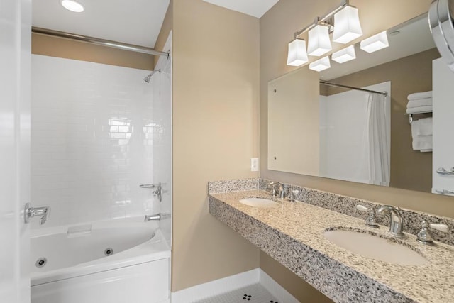 4200 Main St Unit 31 & G-6, Bay Harbor, MI 49770 - full bath featuring a combined bath / shower with jetted tub, double vanity, baseboards, and tile patterned flooring
