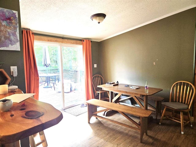 05671 N M-66 N, Charlevoix, MI 49720 - dining area with ornamental molding, a textured ceiling, and wood finished floors