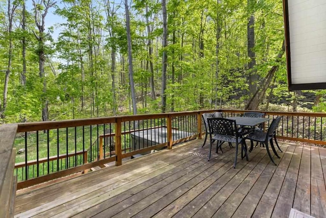 426 Chamonix Ln, Harbor Springs, MI 49740 - wooden terrace featuring outdoor dining space