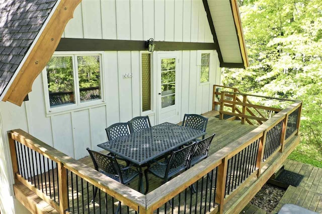 426 Chamonix Ln, Harbor Springs, MI 49740 - wooden terrace with outdoor dining area