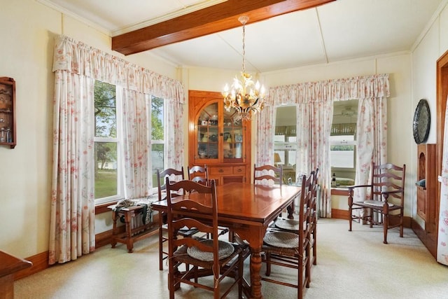 1788 N Shore Dr, Walloon Lake, MI 49796 - dining area featuring a chandelier, ornamental molding, baseboards, light colored carpet, and beamed ceiling