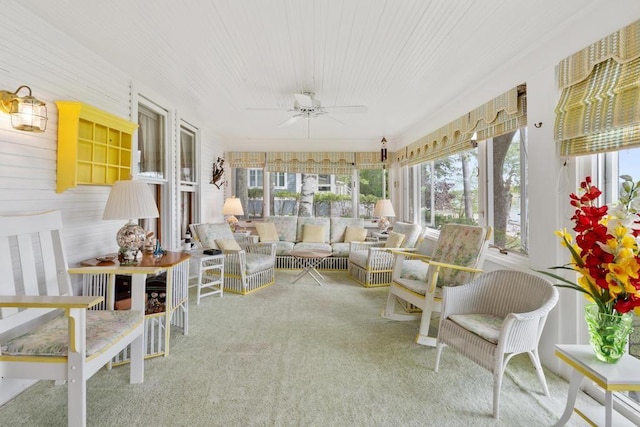 1788 N Shore Dr, Walloon Lake, MI 49796 - sunroom / solarium featuring ceiling fan, an outdoor hangout area, and carpet