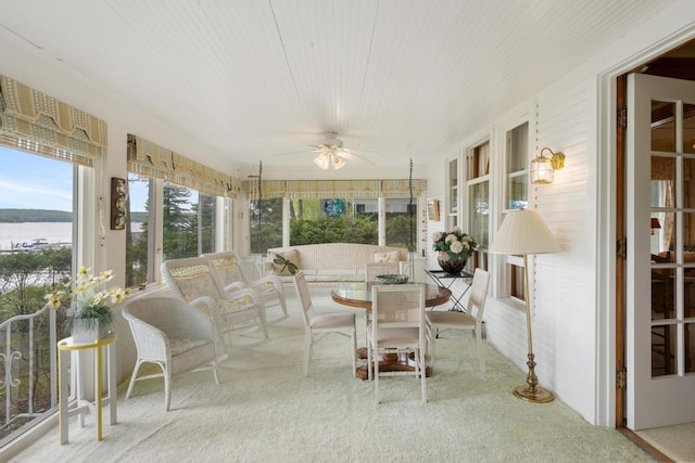 1788 N Shore Dr, Walloon Lake, MI 49796 - sunroom featuring carpet floors