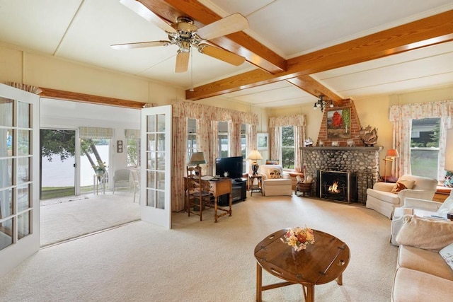 1788 N Shore Dr, Walloon Lake, MI 49796 - living room featuring french doors, carpet floors, beam ceiling, an office area, and a ceiling fan