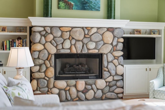 6707 Cottage Ct Unit 40, Bay Harbor, MI 49770 - bedroom / living area view of a fireplace