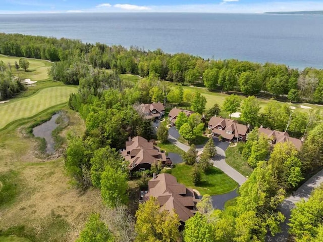 6707 Cottage Ct Unit 40, Bay Harbor, MI 49770 - aerial perspective of suburban area featuring a golf club and a nearby body of water