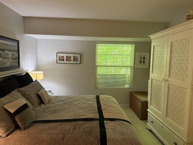 13435 Creekside Ln Unit 4, Charlevoix, MI 49720 - bedroom featuring light colored carpet and baseboards