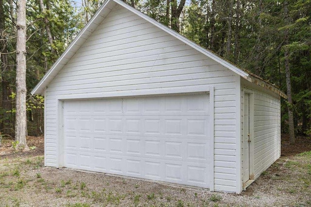 21677 Bluffs Hwy, Onaway, MI 49765 - view of detached garage