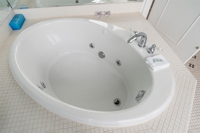 824 Vista Dr Unit 64, Bay Harbor, MI 49770 - bathroom view of a jetted tub