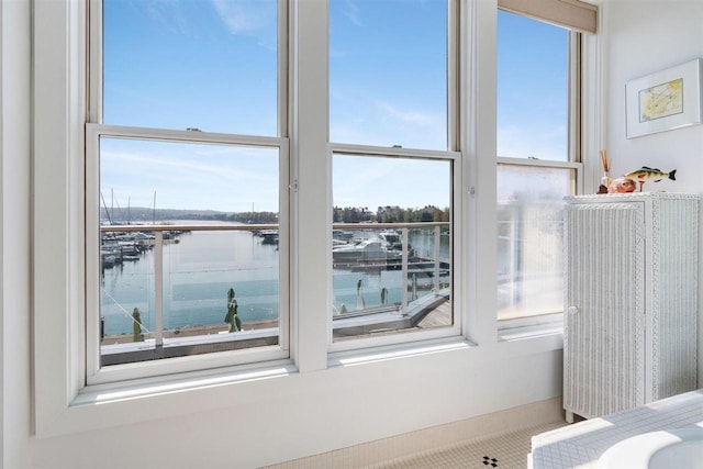 824 Vista Dr Unit 64, Bay Harbor, MI 49770 - bedroom with a water view