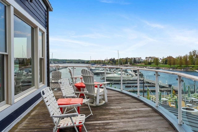 824 Vista Dr Unit 64, Bay Harbor, MI 49770 - deck featuring a water view