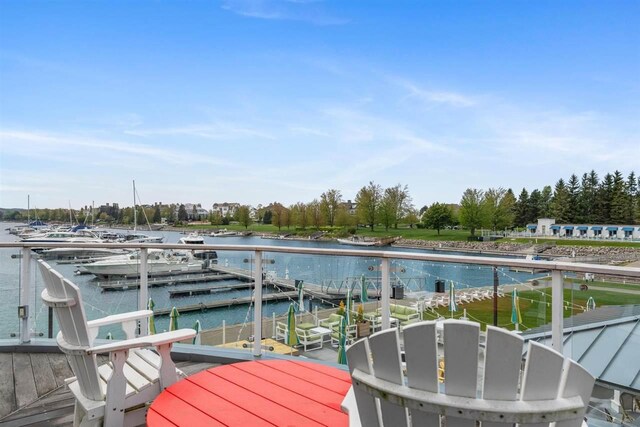 824 Vista Dr Unit 64, Bay Harbor, MI 49770 - dock with a water view