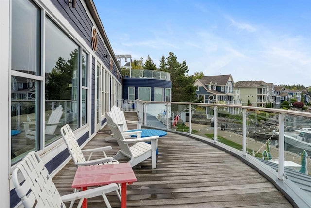 824 Vista Dr Unit 64, Bay Harbor, MI 49770 - view of wooden deck