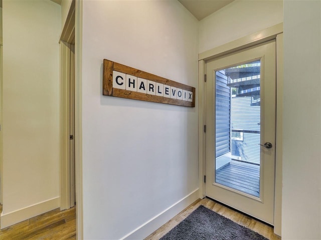 103 Riverwalk Ln Unit 103, Charlevoix, MI 49720 - entryway featuring wood finished floors and baseboards