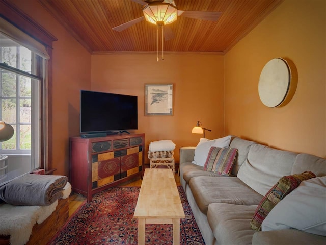 7671 Hoyt Rd, Harbor Springs, MI 49740 - living area with wood ceiling, wood finished floors, ornamental molding, and a ceiling fan