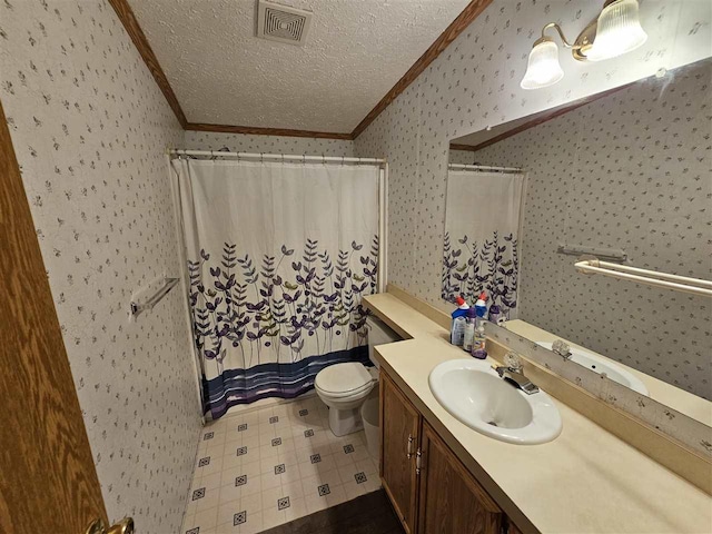 394 Townline Rd, Pellston, MI 49769 - full bathroom with ornamental molding, toilet, a textured ceiling, vanity, and wallpapered walls