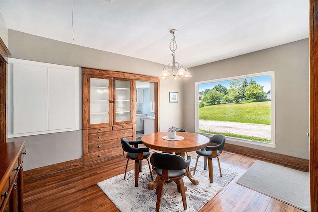 5791 Lebaron St, Levering, MI 49755 - dining area featuring hardwood / wood-style floors