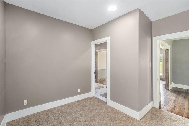 5791 Lebaron St, Levering, MI 49755 - spare room with baseboards, carpet floors, and recessed lighting