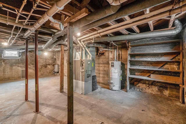 5791 Lebaron St, Levering, MI 49755 - below grade area featuring water heater and heating unit