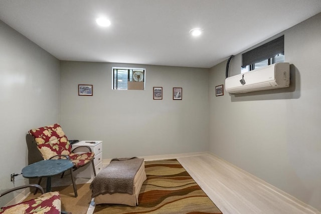 12593 Fern Pl, Charlevoix, MI 49720 - sitting room with recessed lighting and a wall mounted AC