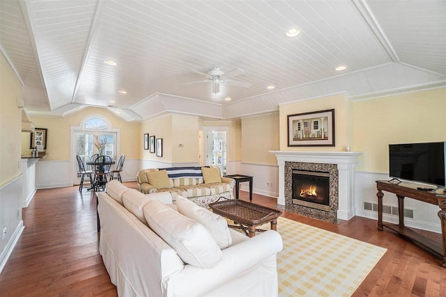 193 E Main St Unit 4, Harbor Springs, MI 49740 - living room with lofted ceiling, wood finished floors, a fireplace with flush hearth, a ceiling fan, and recessed lighting