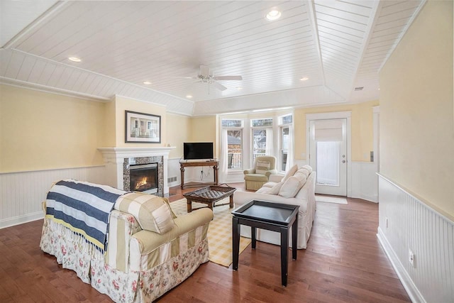 193 E Main St Unit 4, Harbor Springs, MI 49740 - living room featuring a wainscoted wall, a high end fireplace, wood finished floors, ceiling fan, and wooden ceiling