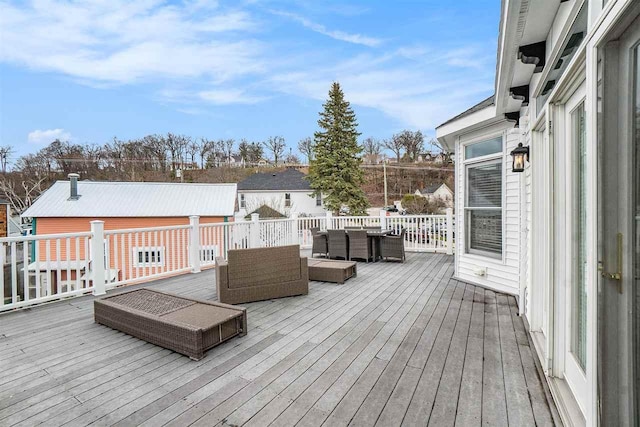 193 E Main St Unit 4, Harbor Springs, MI 49740 - wooden deck featuring a residential view and an outdoor hangout area