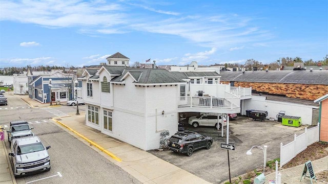 193 E Main St Unit 4, Harbor Springs, MI 49740 - exterior space featuring uncovered parking and a residential view