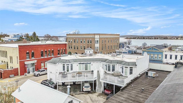 193 E Main St Unit 4, Harbor Springs, MI 49740 - view of property featuring a water view and central AC