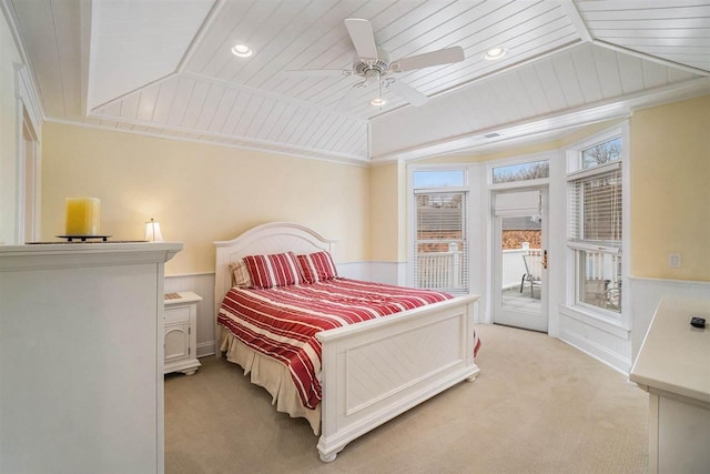 193 E Main St Unit 4, Harbor Springs, MI 49740 - bedroom with light colored carpet, access to outside, a wainscoted wall, wood ceiling, and vaulted ceiling