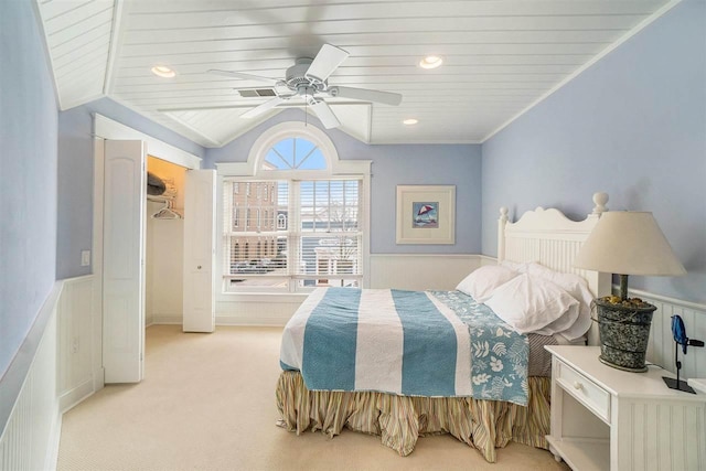 195 E Main St Unit 5, Harbor Springs, MI 49740 - bedroom featuring a wainscoted wall, light carpet, ceiling fan, vaulted ceiling, and recessed lighting