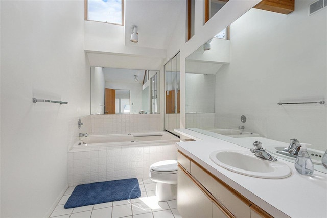 3480 Lakeside Dr N Unit 35, Petoskey, MI 49770 - bathroom featuring a garden tub, toilet, tile patterned floors, plenty of natural light, and a high ceiling