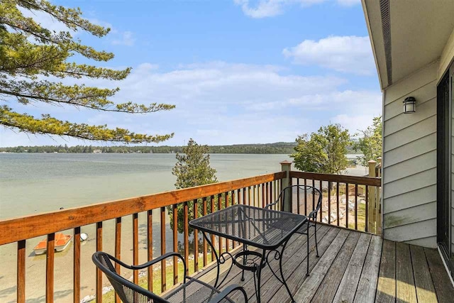 3480 Lakeside Dr N Unit 35, Petoskey, MI 49770 - wooden deck with a water view