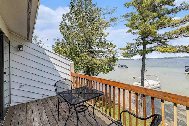 3480 Lakeside Dr N Unit 35, Petoskey, MI 49770 - wooden terrace featuring a water view