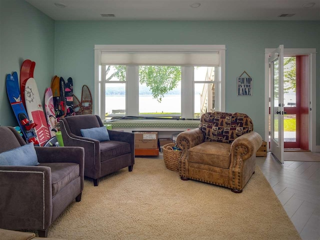 169 E Shadow Trails Rd, Boyne City, MI 49712 - living area with plenty of natural light and french doors