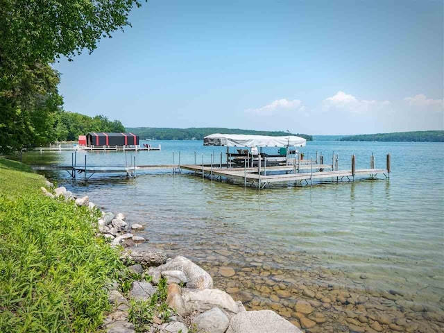 169 E Shadow Trails Rd, Boyne City, MI 49712 - dock featuring a water view and boat lift