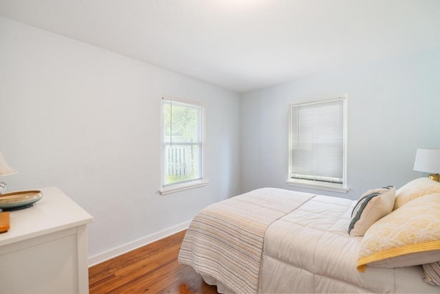 1029 Howard St, Petoskey, MI 49770 - bedroom featuring wood finished floors and baseboards