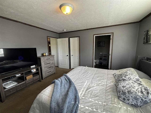 6685 M-66 N, Charlevoix, MI 49720 - bedroom featuring ornamental molding, carpet floors, a textured ceiling, and connected bathroom