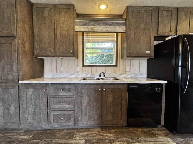 6685 M-66 N, Charlevoix, MI 49720 - kitchen with black appliances, a sink, light stone counters, and dark brown cabinetry