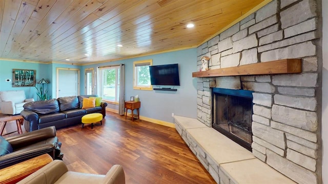 8512 Dutchman Bay Rd, East Jordan, MI 49727 - living room featuring wooden ceiling, baseboards, wood finished floors, a fireplace, and recessed lighting