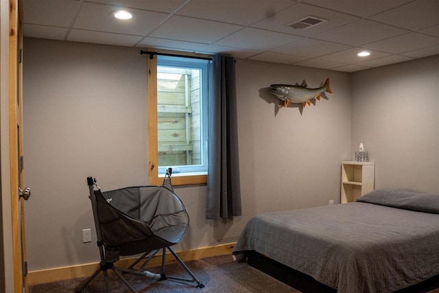 8512 Dutchman Bay Rd, East Jordan, MI 49727 - carpeted bedroom featuring a drop ceiling, baseboards, and recessed lighting