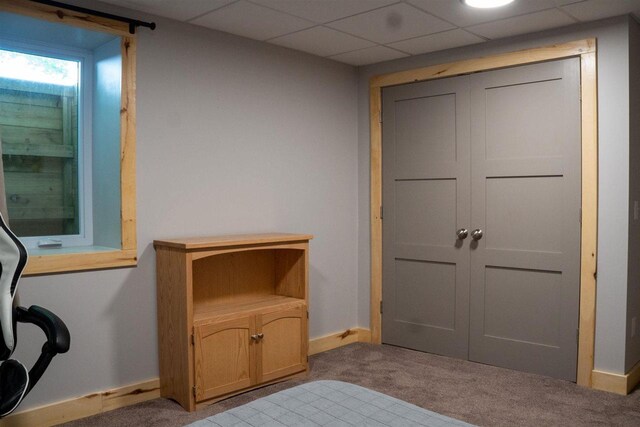 8512 Dutchman Bay Rd, East Jordan, MI 49727 - bedroom with carpet floors and a closet