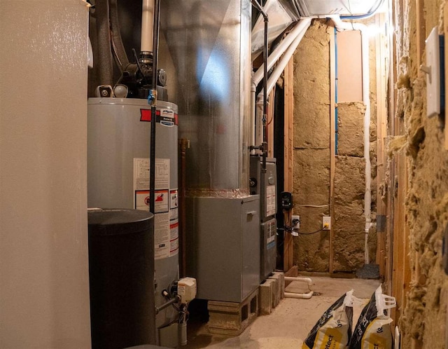 8512 Dutchman Bay Rd, East Jordan, MI 49727 - utility room featuring water heater