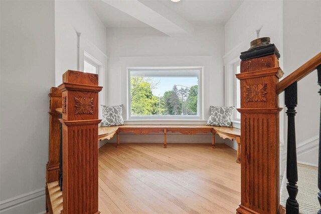 503 N Bridge St, Bellaire, MI 49615 - unfurnished room featuring plenty of natural light, light wood-type flooring, and stairs