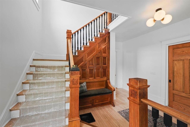503 N Bridge St, Bellaire, MI 49615 - staircase with wood-type flooring and baseboards