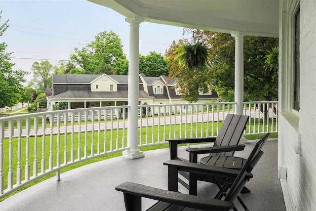 503 N Bridge St, Bellaire, MI 49615 - covered porch with a yard