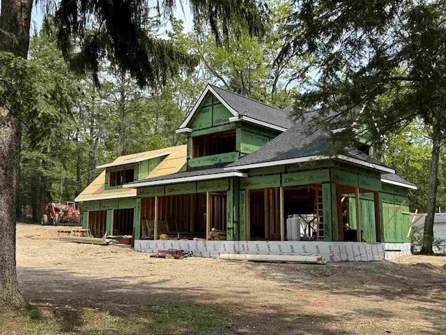 572 W Bluff, Harbor Springs, MI 49740 - property in mid-construction featuring an attached garage