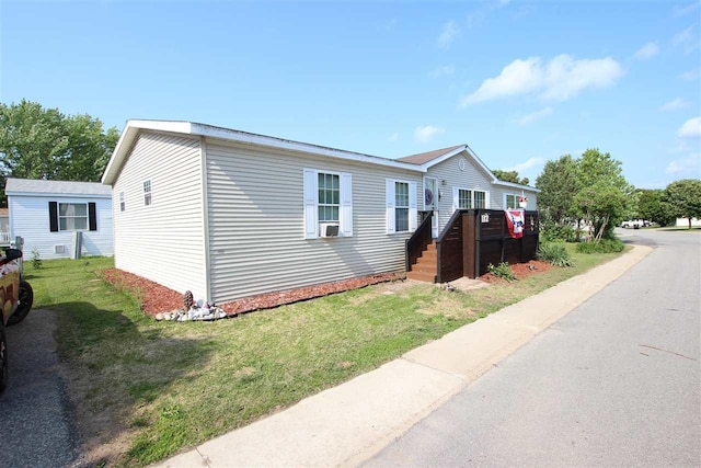 6685 M-66 Hwy, Charlevoix, MI 49720 - view of front of property with a front yard