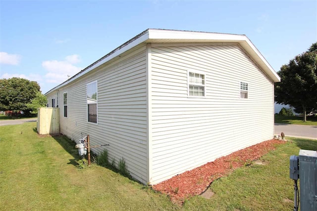 6685 M-66 Hwy, Charlevoix, MI 49720 - view of home's exterior featuring a lawn